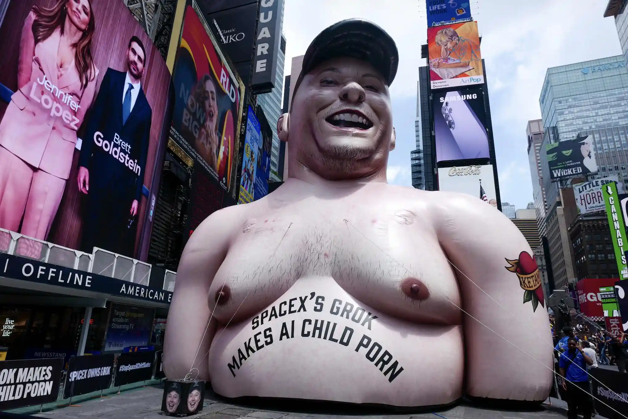 Giant Elon Musk Effigy Appears in Times Square Ahead of SpaceX IPO